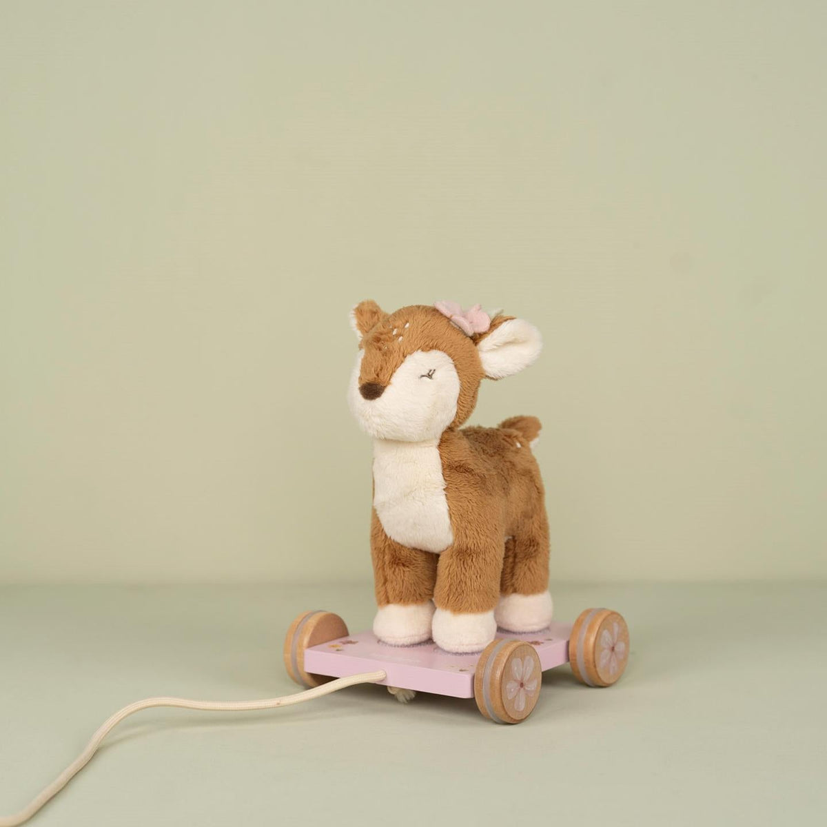 Child pulling the Little Dutch Fairy Garden deer pull-along toy
