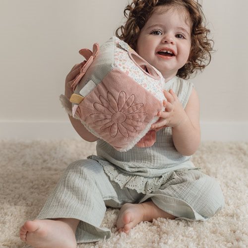 Baby playing with the Miffy Lucky Blossom activity cube