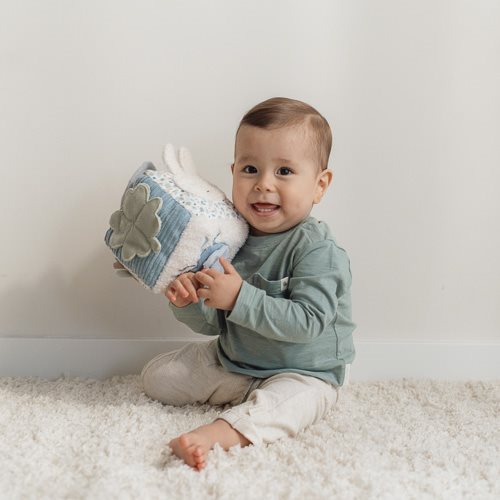 Baby playing with the Miffy Lucky Leaves activity cube