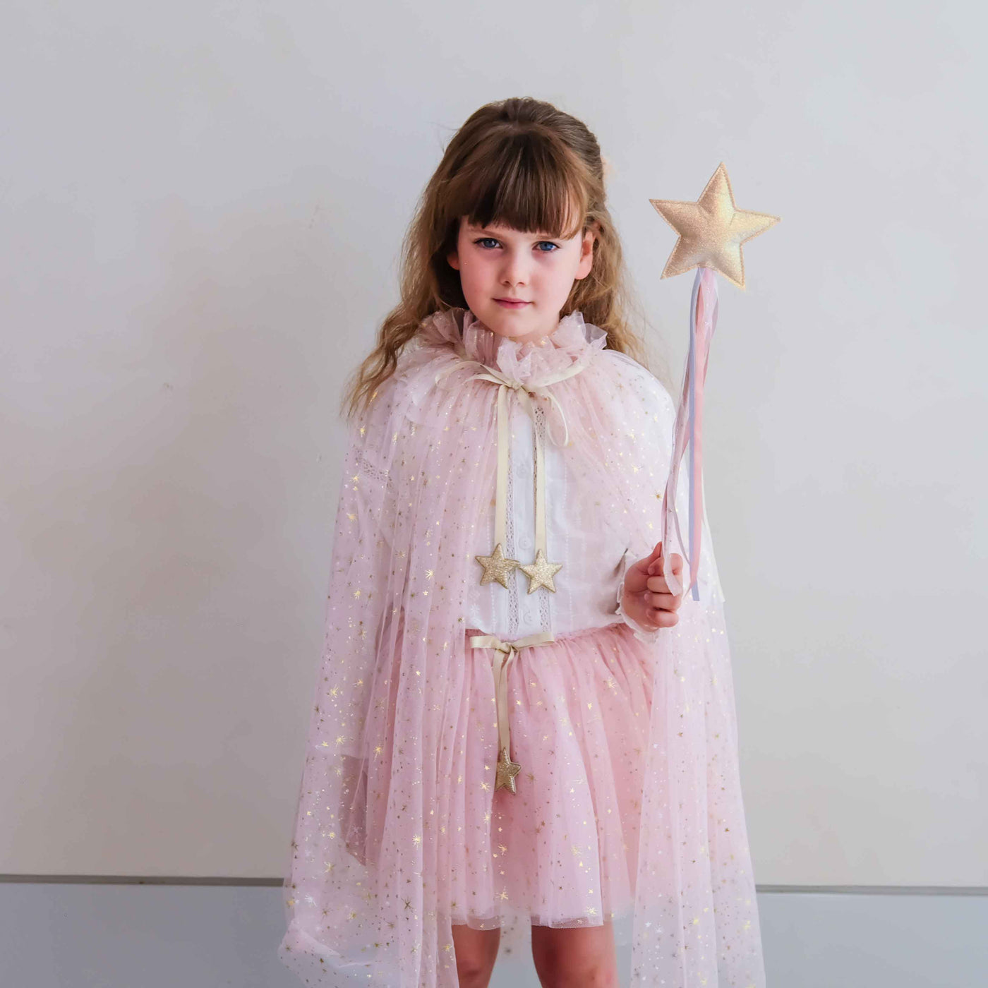 Mimi & Lula Pretty Sparkly Wand held in dress up play