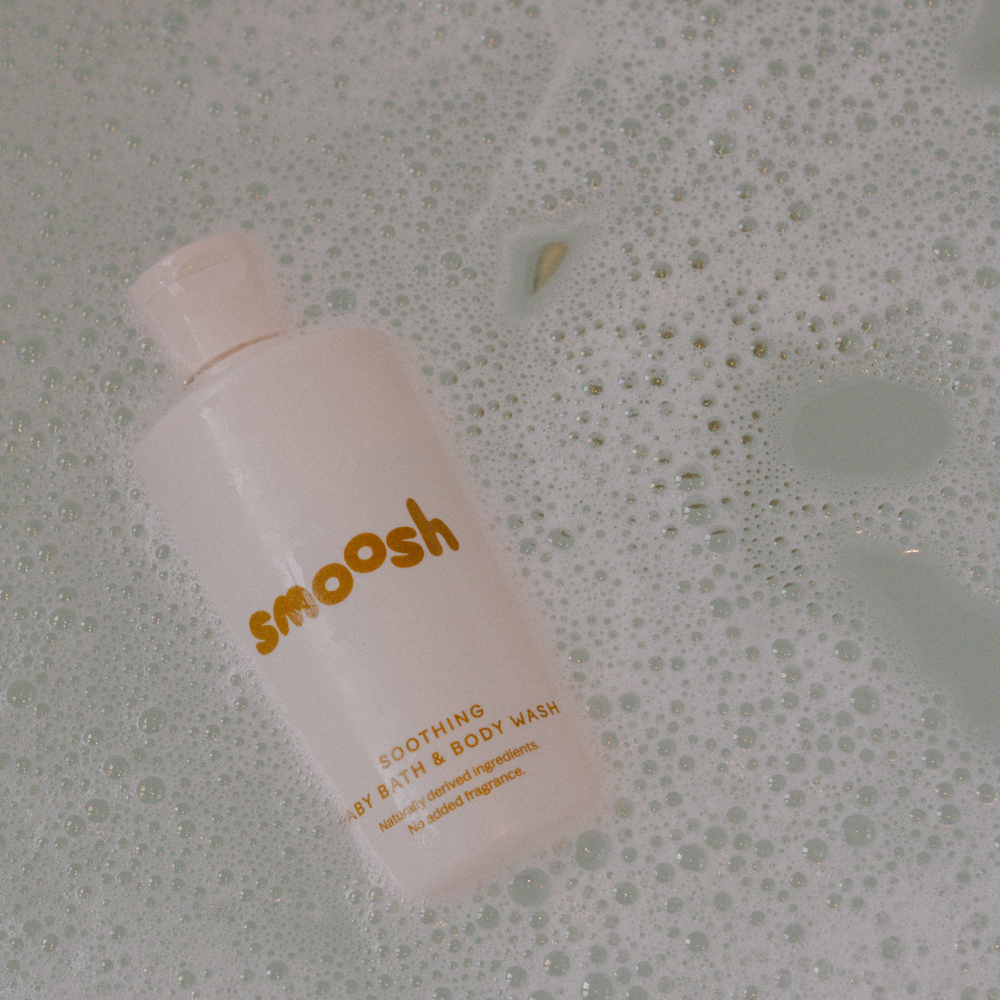 Baby in the bath using Smoosh soothing bath and body wash