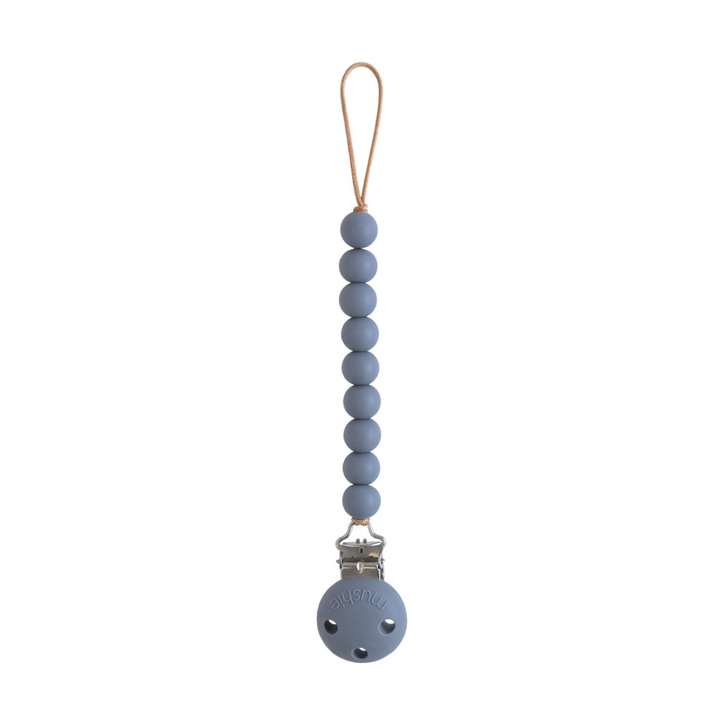 Mushie Hera silicone pacifier clip in Tradewinds