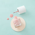 Little Stardust Luna Pink water-based kids' nail polish in an 8ml glass bottle with wooden lid