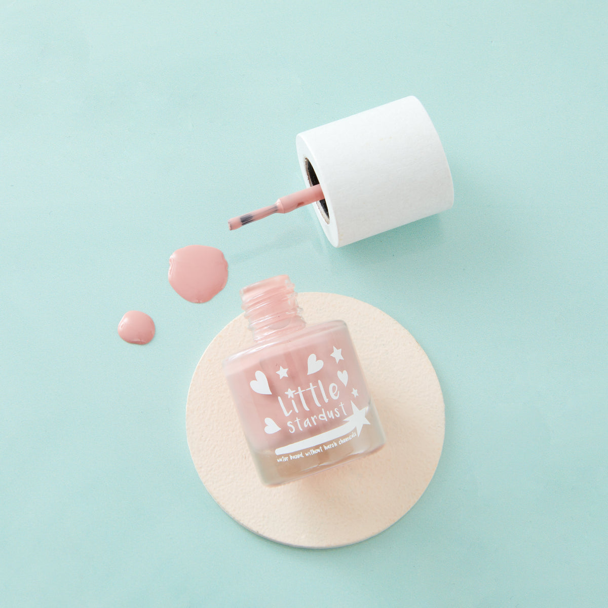 Little Stardust Luna Pink water-based kids' nail polish in an 8ml glass bottle with wooden lid