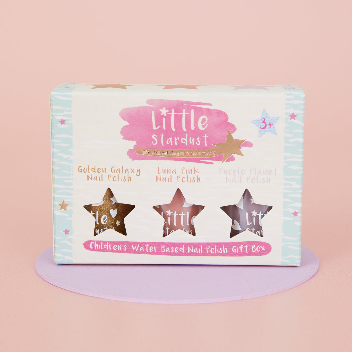 Three Little Stardust water-based nail polish bottles with wooden lids