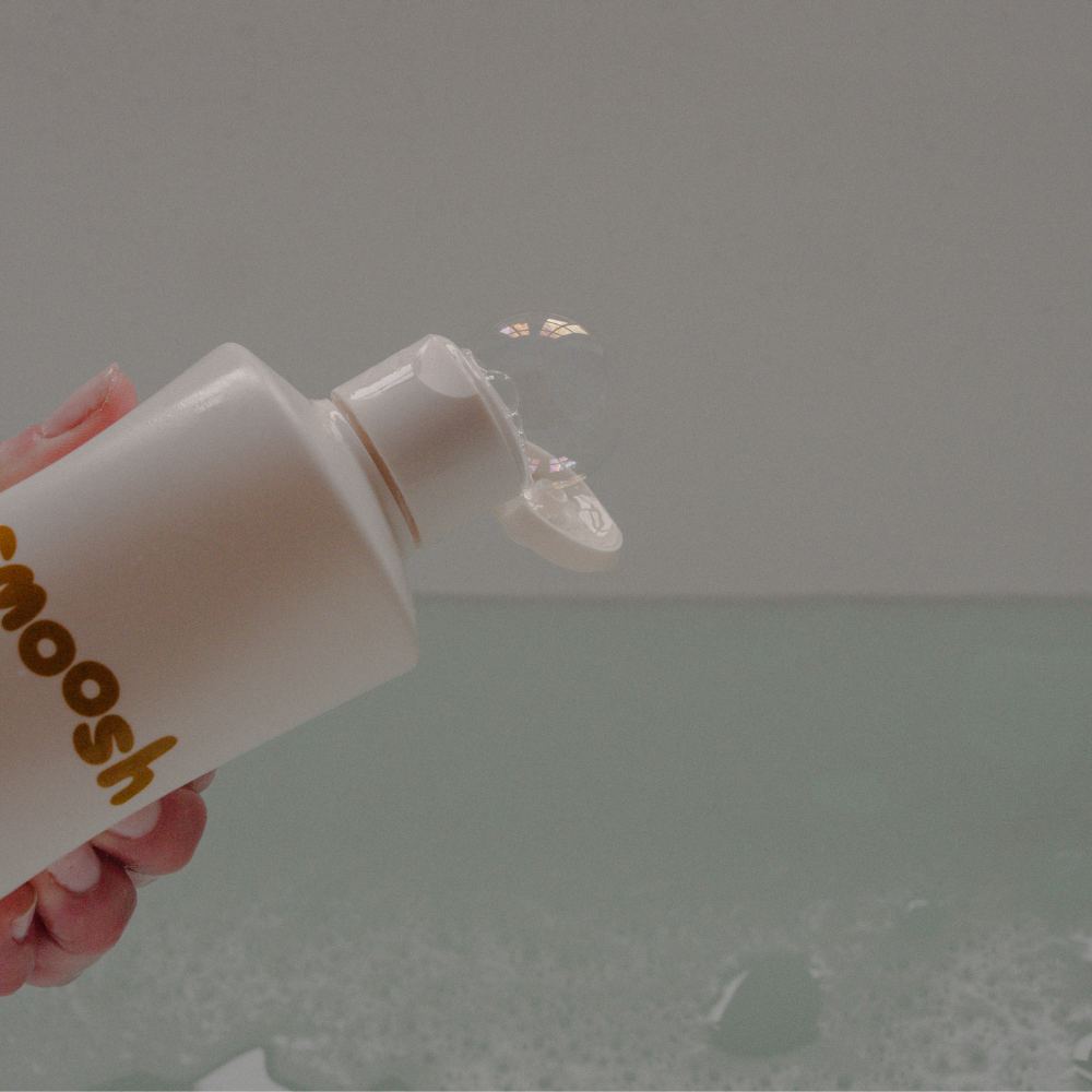 Smoosh baby bath and body wash creating gentle bubbles