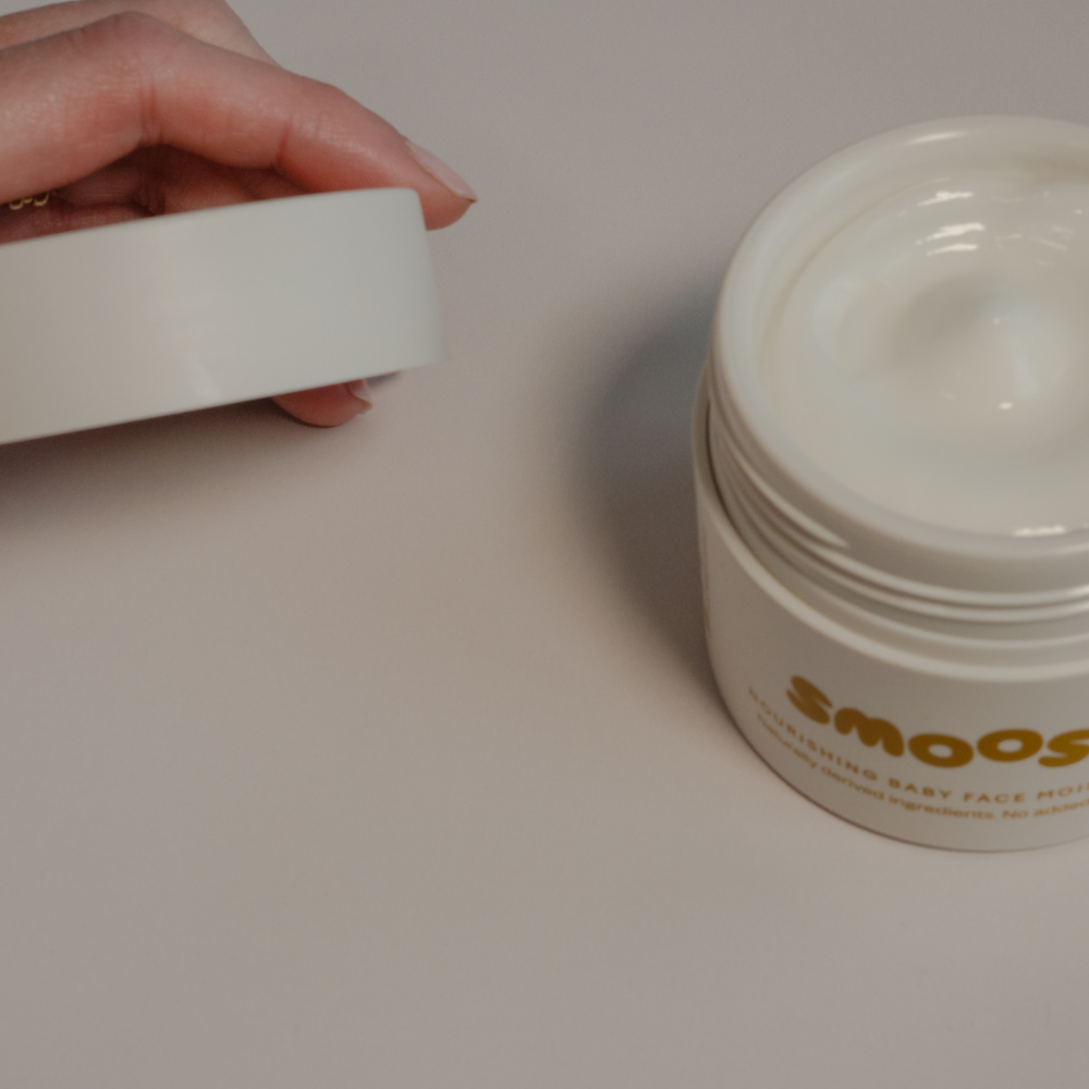Smoosh baby face moisturiser open jar showing the cream texture